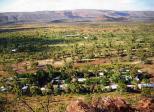 Temple Bar Caravan Park - Alice Springs: Overview of the park in glorious rugged country.