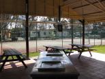 Armidale Tourist Park and YHA - Armidale: View of tennis court from Camp Kitchen
