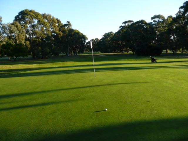 Bairnsdale Golf Course - Bairnsdale: Green on Hole 17 looking back along fairway.
