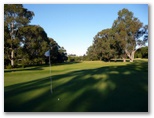 Bairnsdale Golf Course - Bairnsdale: Green on Hole 14 looking back along fairway.