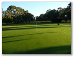 Bairnsdale Golf Course - Bairnsdale: Green on Hole 17 looking back along fairway.