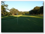 Bairnsdale Golf Course - Bairnsdale: Green on Hole 18 looking back along fairway.