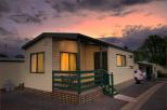 Eureka Stockade Holiday and Caravan Park   - Ballarat: View of cabin 1 with evening lights