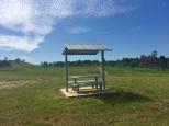 Glenriddle Reserve - Woodsreef: Sheltered outdoor picnic table.