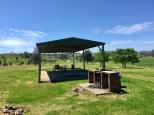 Glenriddle Reserve - Woodsreef: Sheltered barbecue area with water available for dishwashing.