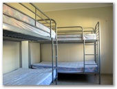 Surfrider Caravan Park - Barrack Point: Second bedroom with bunk beds