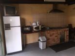 Bega Caravan Park - Bega: Interior of camp kitchen.