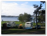 Belmont Pines Lakeside Holiday Park - Belmont: Powered sites for caravans looking west towards the lake