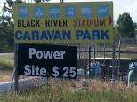 Black River Stadium Caravan Park - Black River: Signage at Bruce Hwy cnr Black River Rd caravan park 8 kilometers on right 