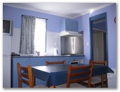 Sunrise Caravan Park - Broadwater: Dining and kitchen area in the cottage