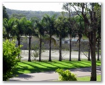 BIG4 Bungalow Park - Burrill Lake: Tennis courts surrounded by palm trees.