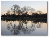 Flame Lily Adventures Caravan Park - Burrum River: Sunset reflections