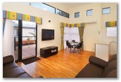 BIG4 Beachlands Holiday Park - Busselton: Plasma TV with surround sound system.  Relax in beautiful leather lounges.