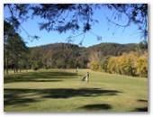 Canungra Area Golf Club - Canungra: Green on Hole 2 looking back along the fairway.