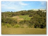 Cape Schanck Golf Course - Cape Schanck: Fairway view on Hole 16 with views of Cape Schanck Resort accommodation on the top right of picture