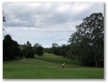 Pacific Golf Course - Carindale Brisbane: Approach to the green on Hole 1.  This is a challenging hole with a creek to clear halfway along the fairway.