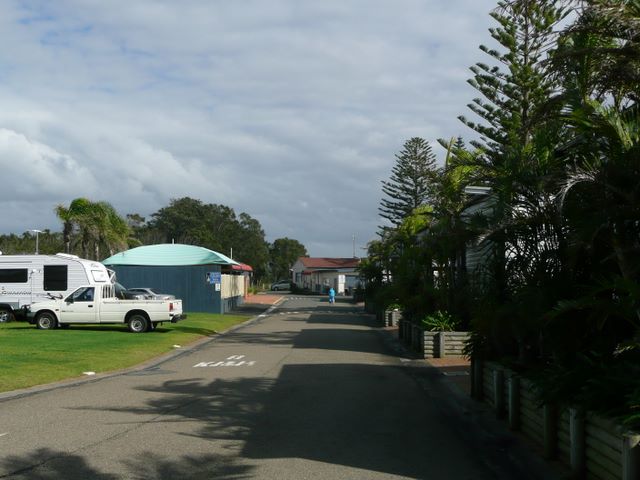 Two Shores Holiday Village, The Entrance NSW - The Entrance: Good paved road as you enter the park.  Cabins on the right and powered sites on the left.