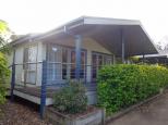 NRMA Ocean Beach Holiday Park - Umina: Cabins facing beach but there is no sea views because of trees