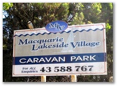 Macquarie Lakeside Village - Chain Valley Bay North: Welcome sign with kookaburra on top left.