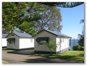 Macquarie Lakeside Village - Chain Valley Bay North: Cottage accommodation, ideal for families, couples and singles.  The cottages have lake views.
