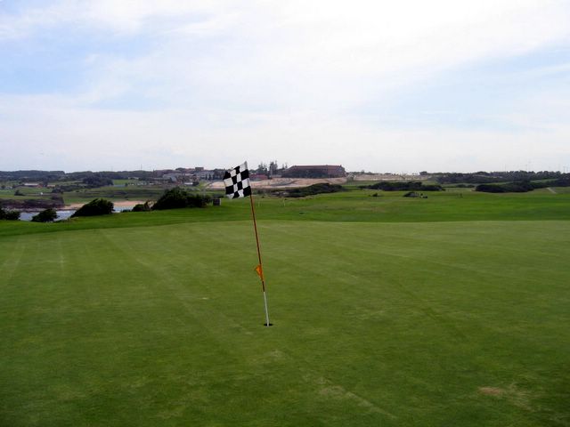 Coast Golf Course - Little Bay: Green on Hole 13.  The old Prince Henry Hospital Nurses Quarters can be seen in the distance. Landcom are now turning this in to residential allotments.