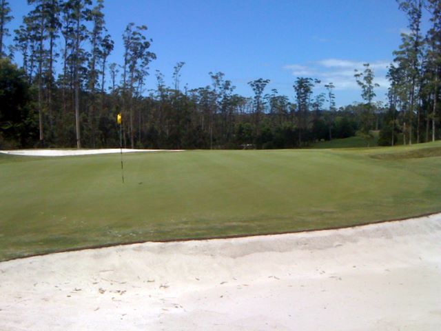 Bonville International Golf Resort - Bonville: Green on Hole 9 surrounded by large bunkers