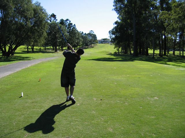 Coffs Harbour Golf Course 19th-27th Hole - Coffs Harbour: Hole 27 Par 4 with club house in the distance