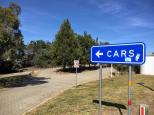 Mundoonen Rest Area - Jerrawa:  Cars follow this sign but caravans and large rigs should park in the truck area .