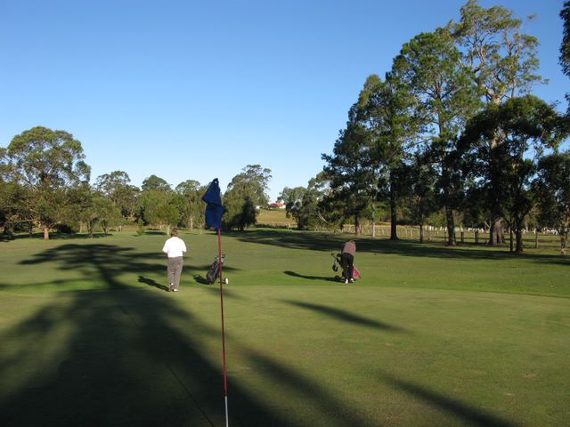 Coraki Golf Course - Coraki: Green on Hole 3 looking back along the fairway.