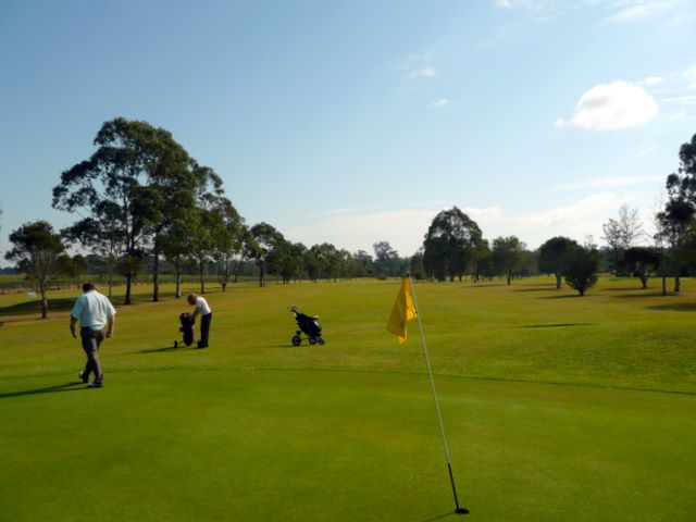 Orara Park Golf Course - Coutts Crossing: Green on Hole 2 looking back along fairway