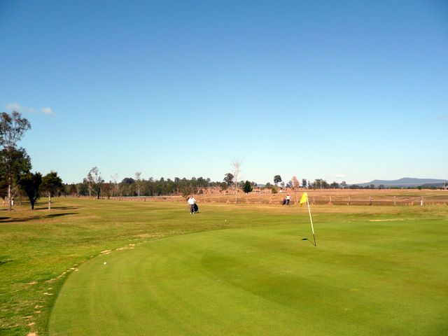 Orara Park Golf Course - Coutts Crossing: Green on Hole 3 looking back along fairway
