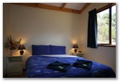 Taunton Farm Holiday Park - Cowaramup: Bedroom in cabin.