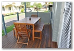 Kangerong Holiday Park - Dromana: Outdoor eating area on cottage verandah