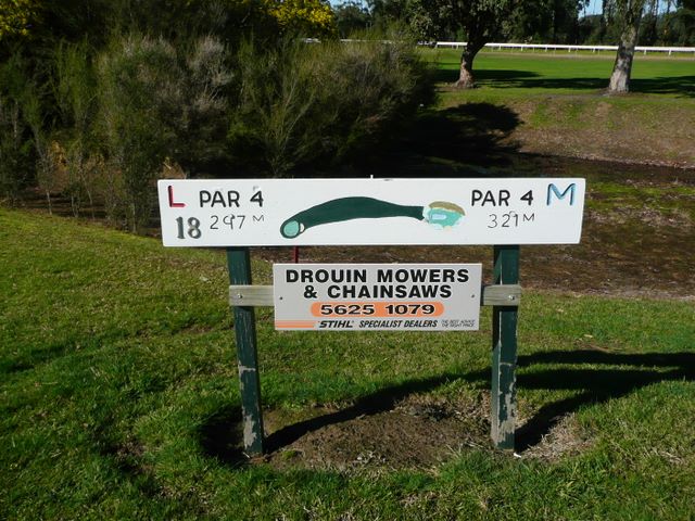 Drouin Golf & Country Club - Drouin: Hole 18 - Par 4, 207 metres.  Sponsored by Drouin Mowers & Chainsaws.