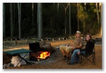 Durras Lake North Holiday Park - Durras North: Relaxing by the fire.
