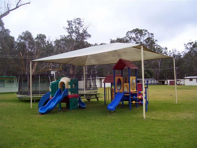 River Bend Caravan Park - Echuca: Grassed recreation and playground area