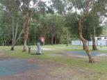 Emerald Beach Holiday Park - Emerald Beach: lots of trees in the park