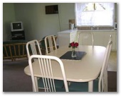 Pine Grove Holiday Park - Esperance: Dining room to two bedroom disabled unit.