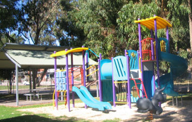 Pink Lake Tourist Park - Sinclair Esperance: Playground for children with picnic area in background.