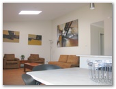 Wollongong Surf Leisure Resort - Fairy Meadow: Dining and lounge room in two bedroom terrace apartment