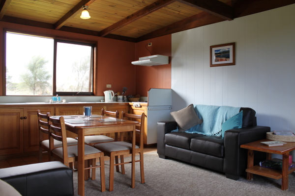 Flinders Island Cabin Park - Flinders Island: Interior of one bedroom unit showing lounge and kitchen.