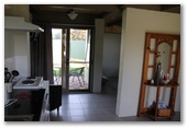 Flinders Island Cabin Park - Flinders Island: Kitchen and outdoor patio in Deluxe Cabin