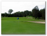 Gainsborough Greens Golf Course - Pimpama: Green on Hole 1 looking back along the fairway.