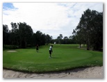 Gainsborough Greens Golf Course - Pimpama: Green on Hole 2 looking back along the fairway.