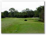 Gainsborough Greens Golf Course - Pimpama: Fairway view on Hole 17 with water to the right and in front of the green.