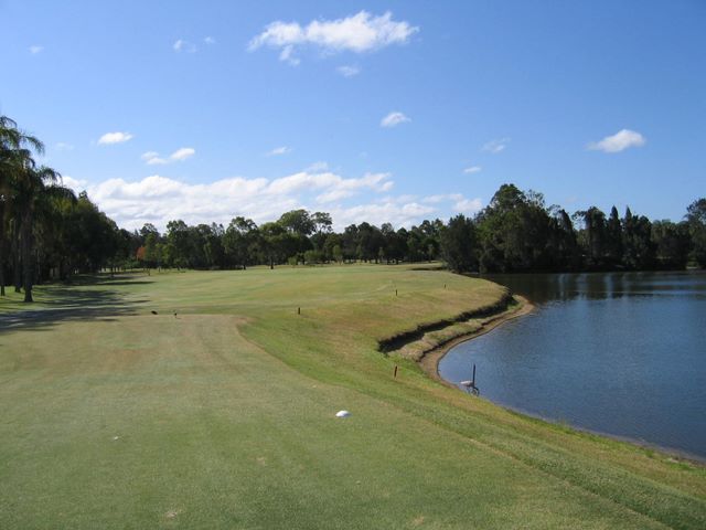 Surfer's Paradise Golf Club - Gold Coast: Hole 18 with extensive water on the right.