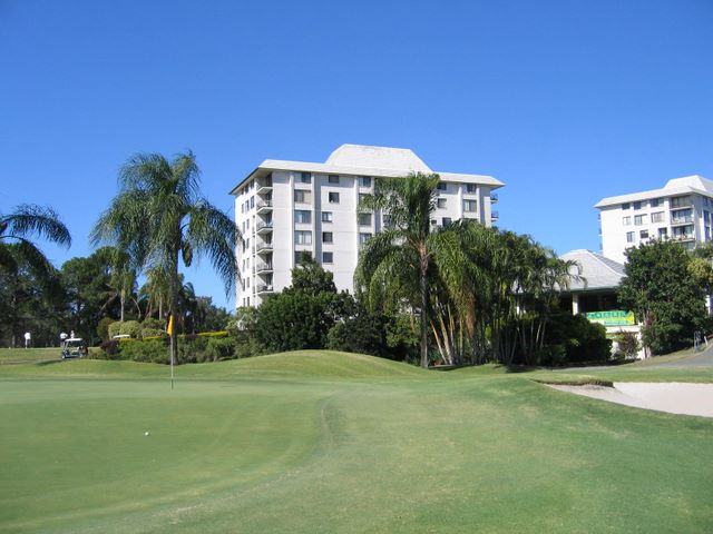 Surfer's Paradise Golf Club - Gold Coast: Green on Hole 18 with Resort and Clubhouse in the background