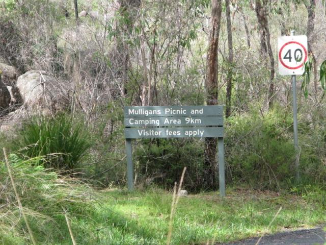 Gibraltar Range Information Centre - Gibraltar Range: Sign to Mulligans Picnic Area which is 9km away.