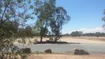 Wangaratta M31 Service Centre - Glenrowan: This open area is unsealed and could be used as parking for large vehicles.