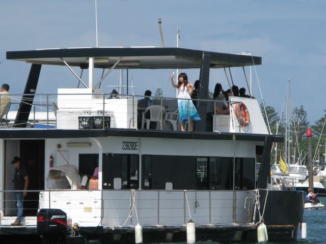 Gold Coast Canals - Gold Coast: Gold Coast Canals - Gold Coast Queensland - Album 1: House boat with photographer on top deck.